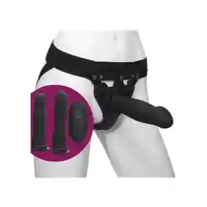 Harness-style strap-on dildo worn on the hips, shown with a large black dildo attached to a belt-style harness with rings and studs, displayed on a white mannequin torso.