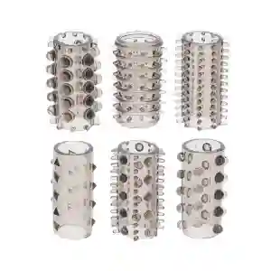 Six textured metal cylindrical sleeves with different patterns of spikes, studs, and bumps, arranged in two rows.