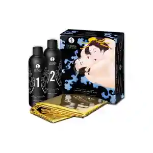 Shunga erotic massage gel set with two black bottles labeled 1 and 2, plus foil packets and a decorative boxed artwork of a couple.